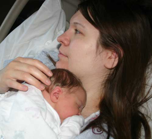 Kari holding her new son, Christian