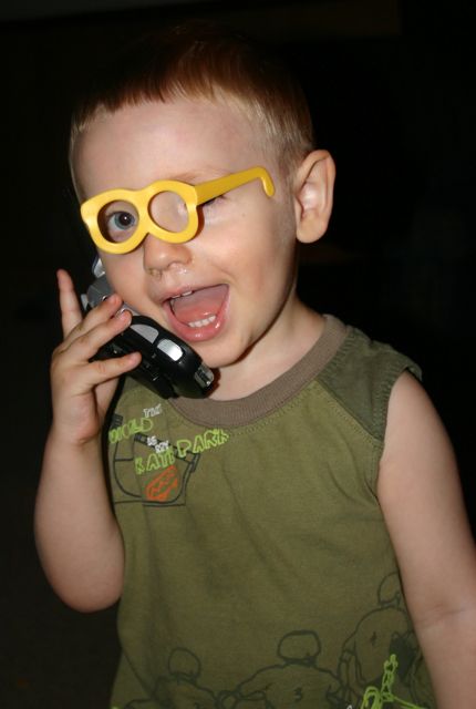 Christian with Mr. Potato Head glasses–talking on the phone